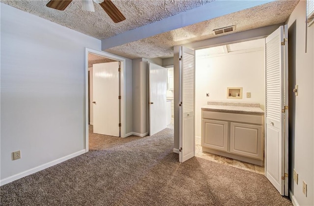 1014 SW Twilight Ln, Blue Springs, MO 64015 - hallway with carpet flooring and a textured ceiling