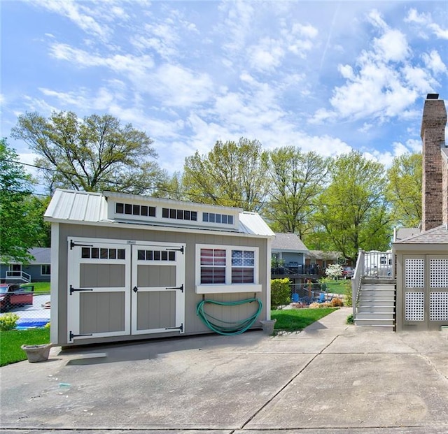 1014 SW Twilight Ln, Blue Springs, MO 64015 - garage with a storage shed