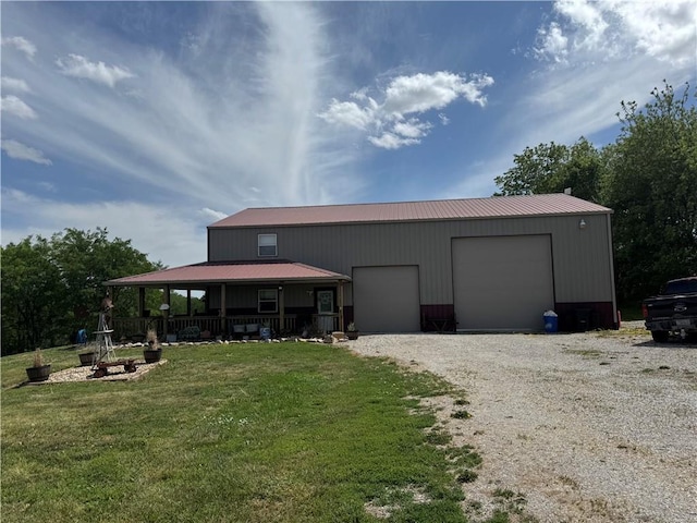 8000 County Road 43, Rosendale, MO 64483 - view of outbuilding with gravel driveway and an attached garage