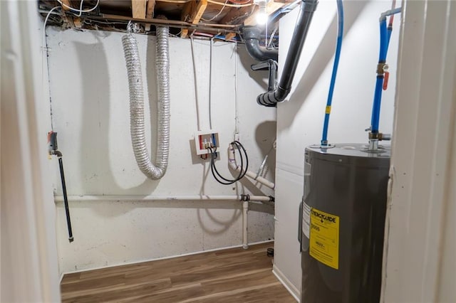 10203 Fremont Ave, Kansas City, MO 64134 - utility room featuring electric water heater