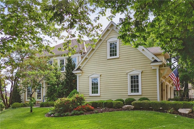 20800 W 94th Ter, Lenexa, KS 66220 - view of side of property with a lawn