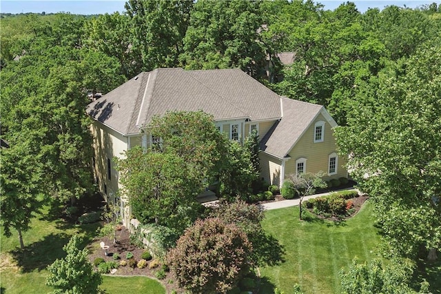 20800 W 94th Ter, Lenexa, KS 66220 - view from above of property with a forest