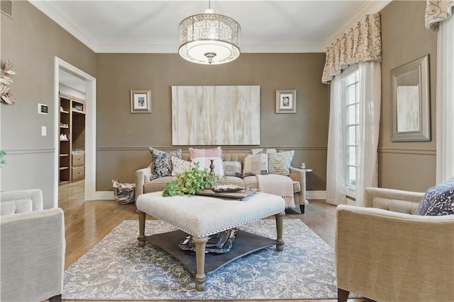 20800 W 94th Ter, Lenexa, KS 66220 - living room featuring wood finished floors, baseboards, and crown molding