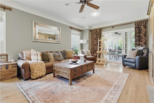 20800 W 94th Ter, Lenexa, KS 66220 - living area with a ceiling fan, crown molding, plenty of natural light, light wood-style floors, and recessed lighting