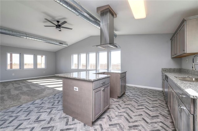 1086 SW 75 Th Rd, Holden, MO 64040 - kitchen featuring vaulted ceiling, open floor plan, ceiling fan, a center island, and island exhaust hood