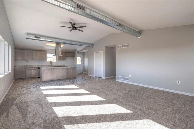 1086 SW 75 Th Rd, Holden, MO 64040 - unfurnished living room featuring light colored carpet, lofted ceiling, and ceiling fan
