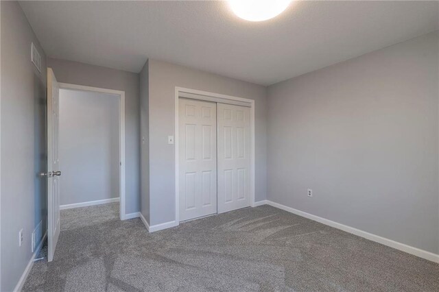 1086 SW 75 Th Rd, Holden, MO 64040 - unfurnished bedroom with carpet floors and a closet