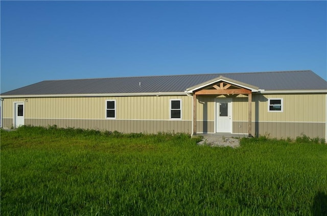 1086 SW 75 Th Rd, Holden, MO 64040 - manufactured / mobile home featuring a metal roof and a front lawn