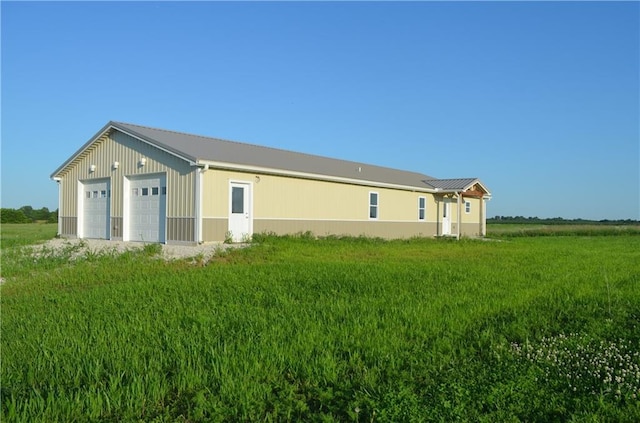 1086 SW 75 Th Rd, Holden, MO 64040 - rear view of house featuring a detached garage