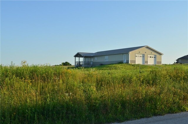 1086 SW 75 Th Rd, Holden, MO 64040 - view of front of property featuring a detached garage