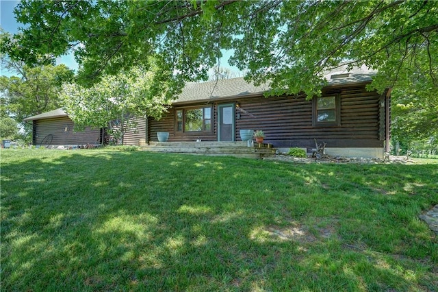 18417 Lake St, Smithville, MO 64089 - view of front facade with log siding and a front lawn
