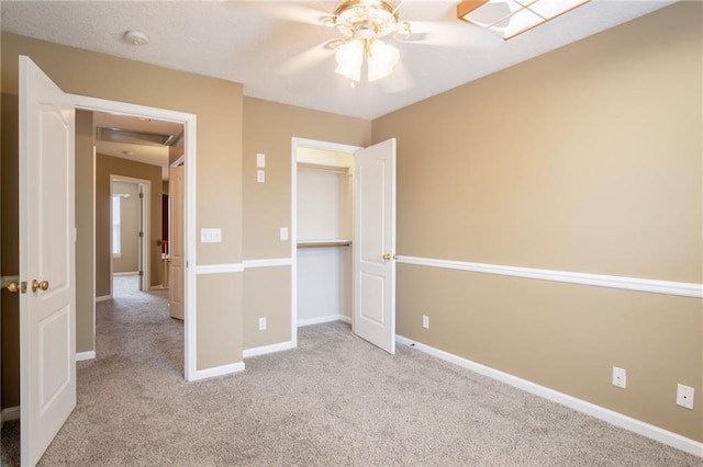 1703 Rolling Rock Rd, Raymore, MO 64083 - unfurnished bedroom with carpet flooring and ceiling fan