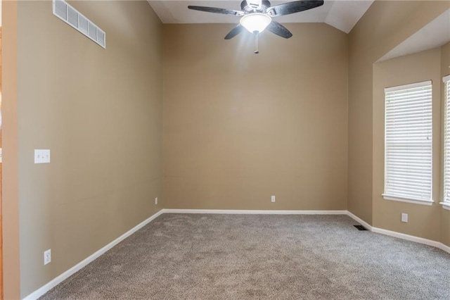 1703 Rolling Rock Rd, Raymore, MO 64083 - empty room with carpet, a ceiling fan, and lofted ceiling