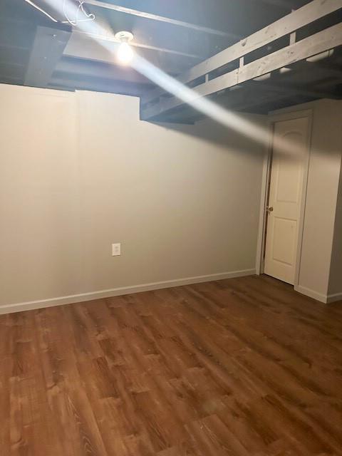 307 SW Glendana St, Lees Summit, MO 64081 - finished below grade area featuring wood finished floors and baseboards