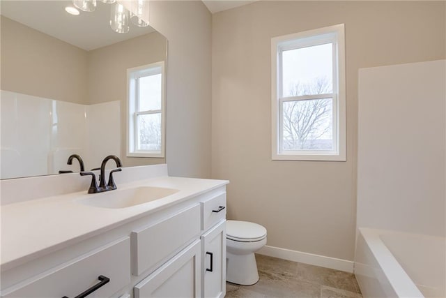 full bath with toilet, a shower, a chandelier, vanity, and baseboards