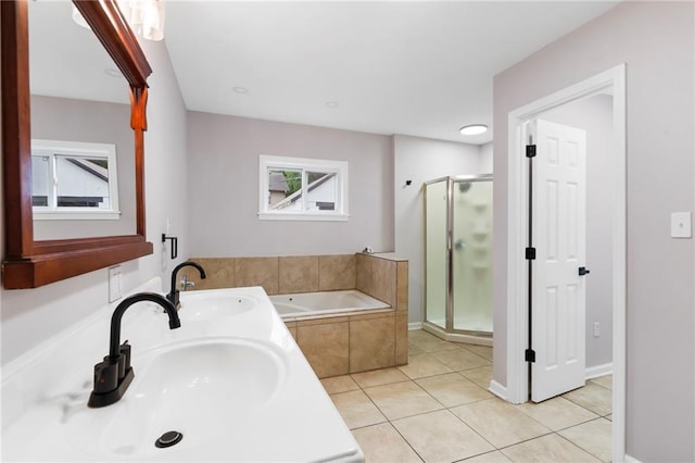 312 2nd St, Ferrelview, MO 64163 - bathroom featuring a sink, a stall shower, tile patterned floors, and a bath