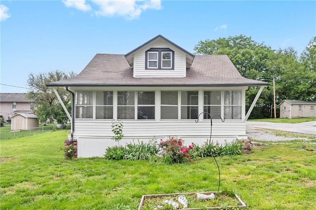 312 2nd St, Ferrelview, MO 64163 - view of front of property with a sunroom