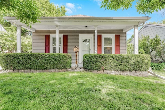 1503 S Spring St, Independence, MO 64055 - view of front of property featuring a front yard and a porch