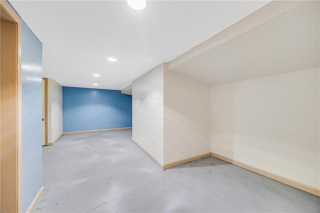 1503 S Spring St, Independence, MO 64055 - bonus room with finished concrete floors, baseboards, and recessed lighting
