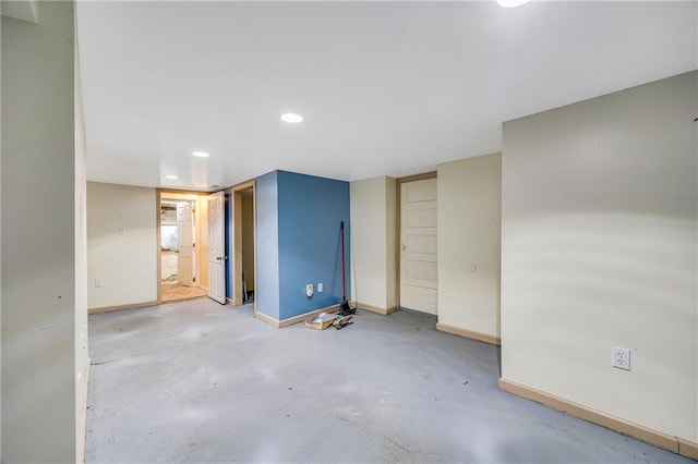 1503 S Spring St, Independence, MO 64055 - below grade area featuring baseboards and recessed lighting