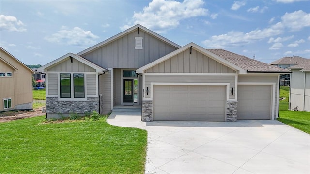 24105 W 58th Pl, Shawnee, KS 66226 - craftsman-style house with an attached garage, board and batten siding, a front yard, driveway, and stone siding
