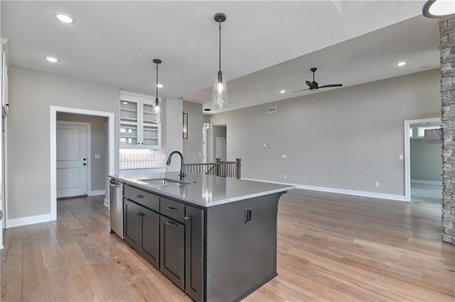 24105 W 58th Pl, Shawnee, KS 66226 - kitchen featuring a sink, ceiling fan, ornate columns, a kitchen island with sink, and recessed lighting