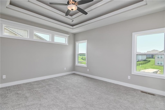 24105 W 58th Pl, Shawnee, KS 66226 - unfurnished room with a tray ceiling, carpet, and baseboards