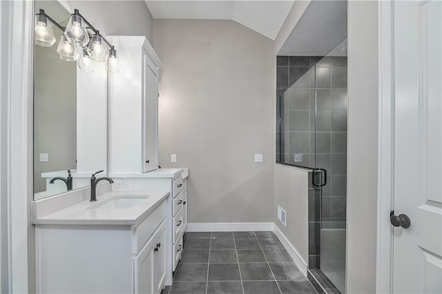 24105 W 58th Pl, Shawnee, KS 66226 - full bath featuring vanity, a stall shower, tile patterned floors, lofted ceiling, and baseboards