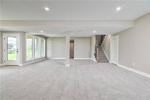 24105 W 58th Pl, Shawnee, KS 66226 - basement with carpet, baseboards, stairs, and recessed lighting