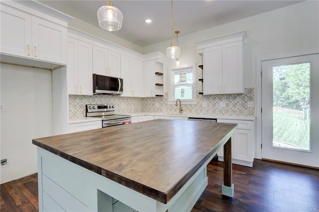 220 Rock Bridge Pkwy, Excelsior Springs, MO 64024 - kitchen featuring appliances with stainless steel finishes, open shelves, wood counters, white cabinets, and recessed lighting