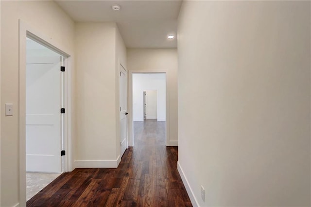 220 Rock Bridge Pkwy, Excelsior Springs, MO 64024 - hall with dark wood finished floors, recessed lighting, and baseboards