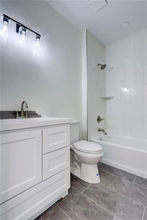 220 Rock Bridge Pkwy, Excelsior Springs, MO 64024 - full bath featuring toilet, vanity, tile patterned flooring, and bathtub / shower combination