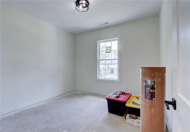 220 Rock Bridge Pkwy, Excelsior Springs, MO 64024 - playroom featuring unfinished concrete floors and baseboards