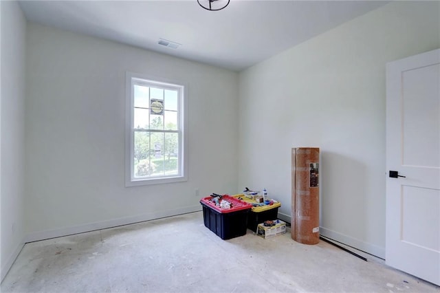 220 Rock Bridge Pkwy, Excelsior Springs, MO 64024 - recreation room with concrete flooring and baseboards