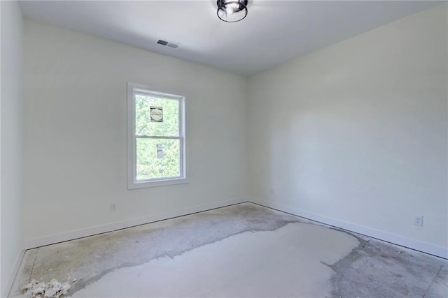 220 Rock Bridge Pkwy, Excelsior Springs, MO 64024 - spare room with baseboards and concrete flooring
