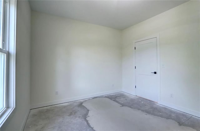 220 Rock Bridge Pkwy, Excelsior Springs, MO 64024 - unfurnished room with unfinished concrete floors and baseboards