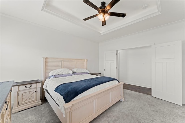 29702 W 195th St, Gardner, KS 66030 - bedroom with a tray ceiling, light colored carpet, crown molding, and a ceiling fan