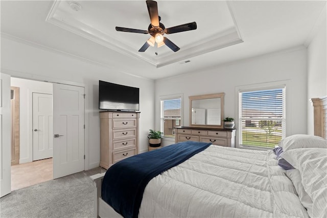 29702 W 195th St, Gardner, KS 66030 - bedroom featuring a raised ceiling, light carpet, crown molding, and a ceiling fan