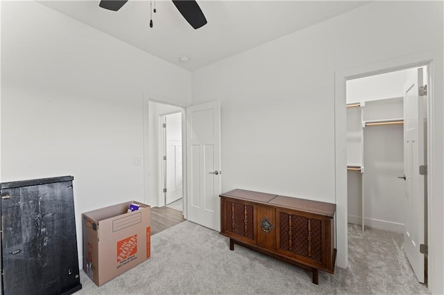 29702 W 195th St, Gardner, KS 66030 - unfurnished bedroom with carpet, a walk in closet, ceiling fan, and a closet