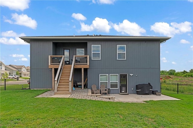 29702 W 195th St, Gardner, KS 66030 - back of property with a patio, stairway, and a wooden deck