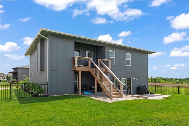29702 W 195th St, Gardner, KS 66030 - back of house featuring stairway, a patio area, and a wooden deck