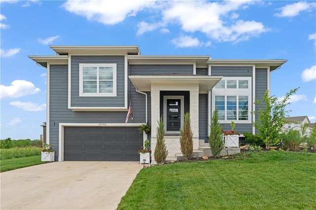 29702 W 195th St, Gardner, KS 66030 - prairie-style home featuring an attached garage, a front yard, and concrete driveway