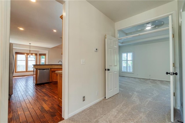 5714 Alden Ct, Shawnee, KS 66216 - corridor featuring baseboards, recessed lighting, dark wood-style floors, and a chandelier