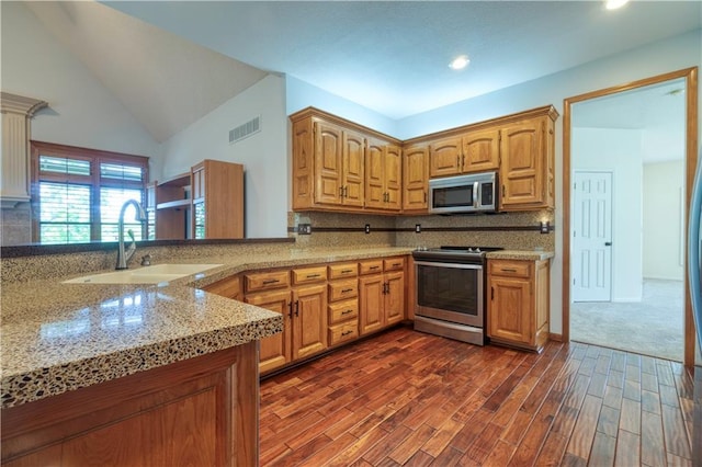 5714 Alden Ct, Shawnee, KS 66216 - kitchen featuring stainless steel appliances, a sink, decorative backsplash, dark wood-style flooring, and recessed lighting
