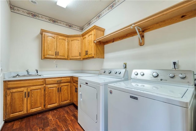 5714 Alden Ct, Shawnee, KS 66216 - laundry area with cabinet space, washing machine and clothes dryer, and dark wood-type flooring