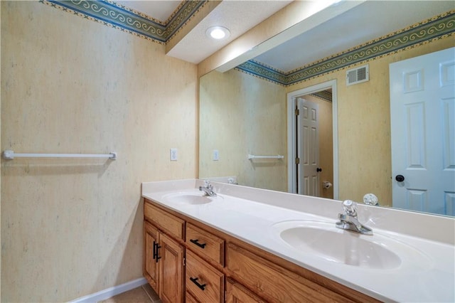 5714 Alden Ct, Shawnee, KS 66216 - bathroom featuring double vanity, baseboards, and tile patterned floors