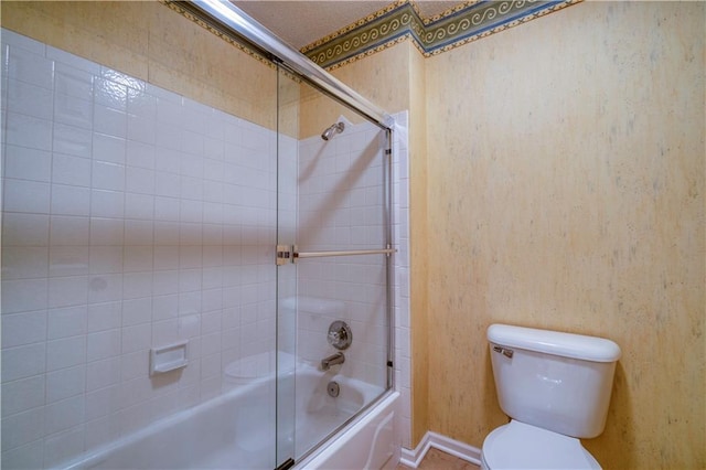5714 Alden Ct, Shawnee, KS 66216 - bathroom featuring toilet and combined bath / shower with glass door