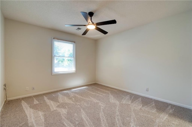 5714 Alden Ct, Shawnee, KS 66216 - carpeted spare room featuring baseboards, ceiling fan, and a textured ceiling