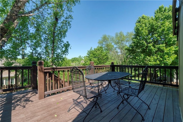 5714 Alden Ct, Shawnee, KS 66216 - wooden deck featuring outdoor dining space