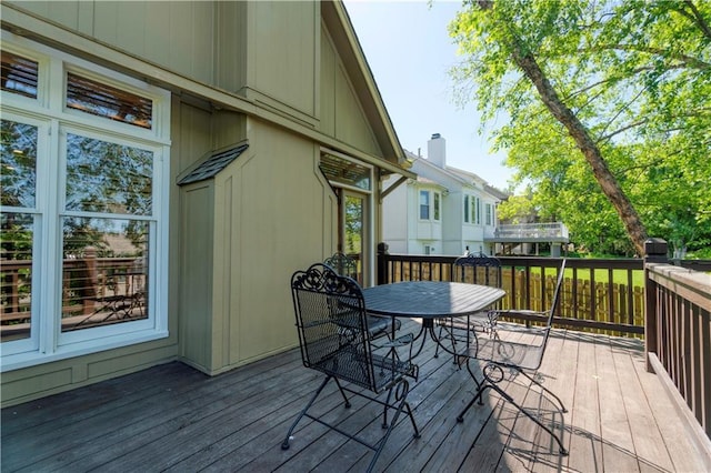 5714 Alden Ct, Shawnee, KS 66216 - wooden terrace featuring outdoor dining space